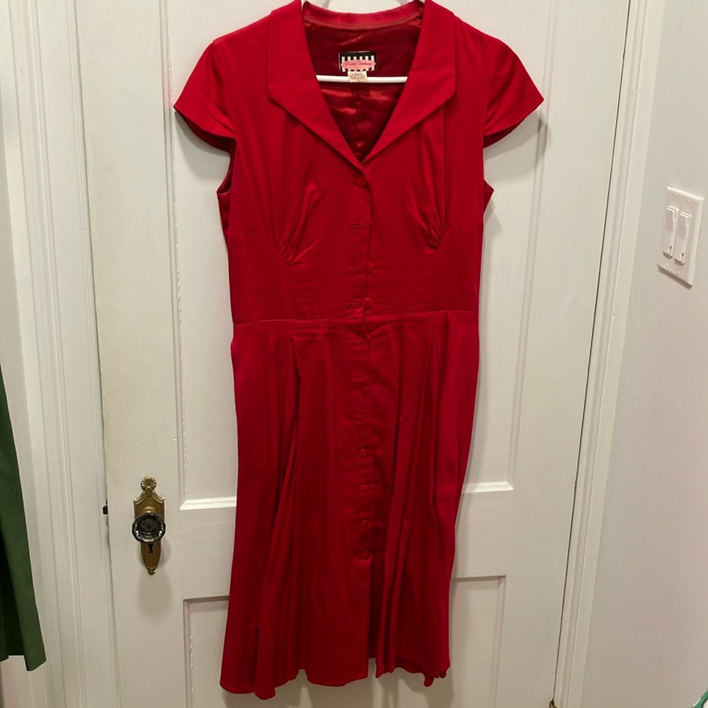 Large Pinup Couture fit & flare red dress. Cap sleeves and hidden pockets!